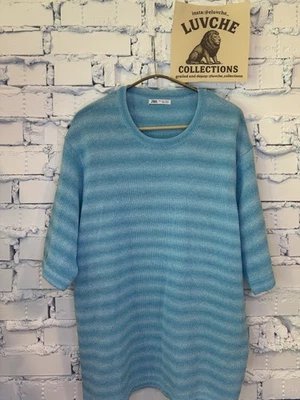 Pullover de manga corta ligero tejido azul grande de Zara para hombre Foto 1 de 4