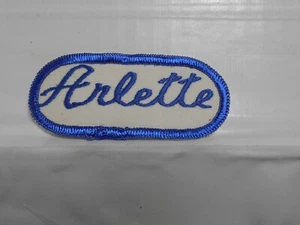 ARLETTE  USED EMBROIDERED SEW ON NAME PATCH TAG OVAL BLUE ON WHITE - Picture 1 of 1