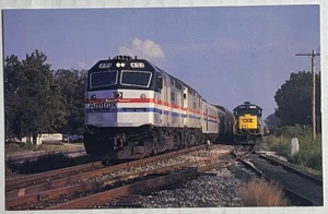 Vtg Railroad Postcard Amtrak Sunset Limited 451 Passing CSX Freight Cade LA 1991 - Picture 1 of 4