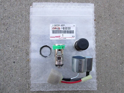 99-09 TOYOTA LAND CRUISER SERIE 70 PERILLA ENCENDEDOR DE CIGARRILLOS OEM NUEVO Foto 1 de 3