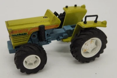 New Ray Farm Motor Friction Diecast & Plastic Toy Farm Tractor Blue Green - Image 1 of 4