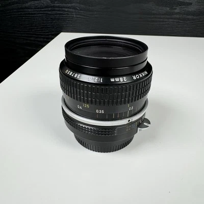 Lente para cámara Nikon Nikkor 28 mm 1:2,8 387850 - sin probar Foto 1 de 4