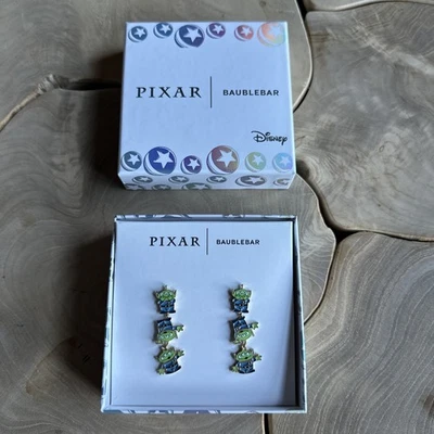 Pendientes colgantes garra alienígena Toy Story de Disney Pixar barra de bolas oro declaración Foto 1 de 4