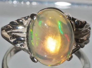 2.35ct Solid ETHIOPIAN WELO OPAL 11x9mm Oval .925 Sterling Silver Ring Size 6 - Picture 1 of 7