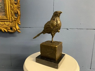 Bronze Sculpture of a small bird of prey on a black marble base after Milo - image 1 of 4