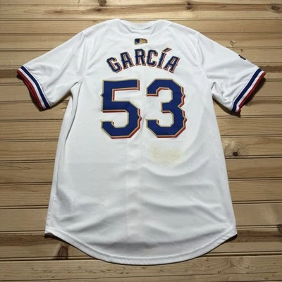 Camiseta Nike Adolis Garcia Texas Rangers Oro 2023 Serie Mundial Campeones - Pequeña Foto 1 de 4