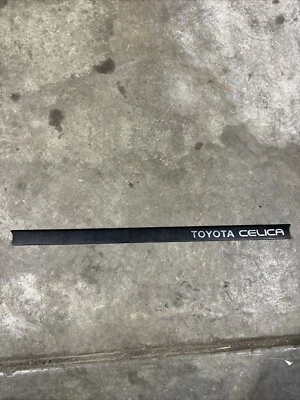 Toyota Celica 84-85 Notchback Cupé Camión Cubierta Tapa Adorno Borde Logo Placa Foto 1 de 4