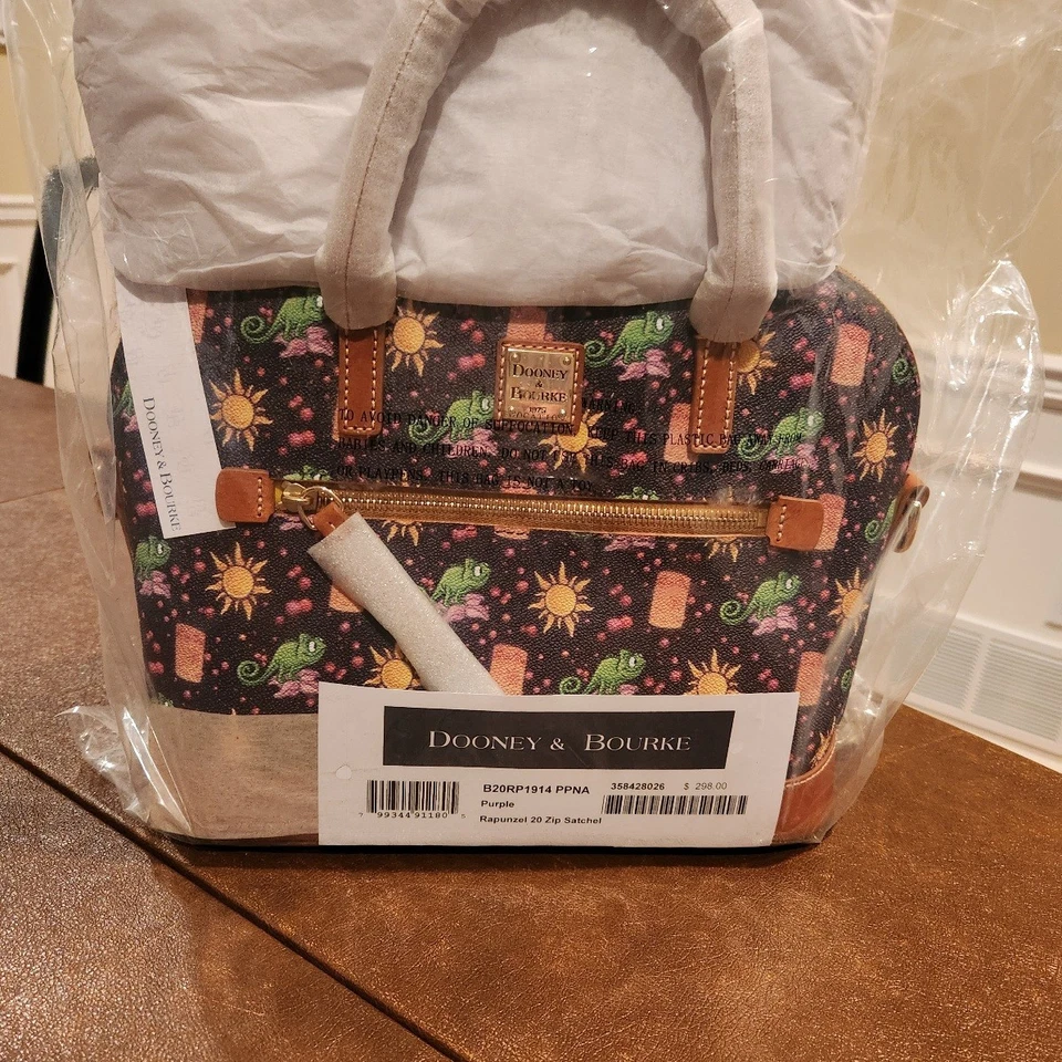 Bolso de Mano Dooney Rapunzel Pascal Enredado Parques Disney 10º Aniversario MWT 2020 Foto 1 de 4