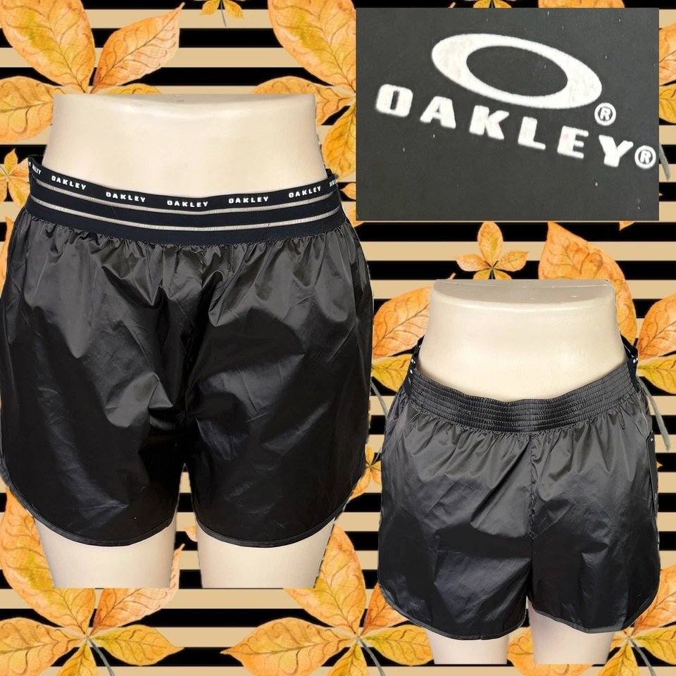 Pantalones cortos de lujo Oakley L con logotipo de ceniza oscura cintura de malla bolsillos laterales de nailon Foto 1 de 4