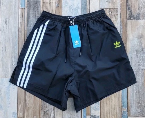 Pantaloncini Adidas Originals 3 strisce retro foderati sport festival donna UK 10 nuovi