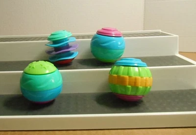 Lote de 4 bolas sensoriales Playskool Roll a Round G25 Foto 1 de 3