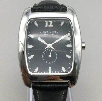 Reloj Anne Klein Mujer 32mm Esfera Negra Estuche Plateado Correa Cuero Batería Nueva Foto 1 de 4