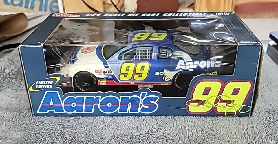 1:24 Scale Diecast Car Nascar Driver 99 Racing Champions Michael Waltrip Aaron's - Image 1 of 2