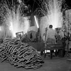 Two flash-butt-welding machines give off sparks resembling fir- 1968 Old Photo