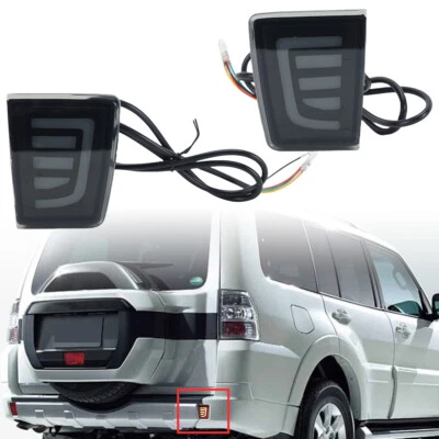 Luces traseras LED ahumadas para parachoques para Mitsubishi Montero Pajero 2007-2021 Foto 1 de 4