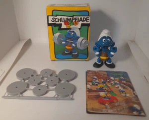 PUFFI  40507  PUFFO PESI  WEIGHTLIFTER SMURF W/MINI GUIDE SCHLEICH da BARBAPUFFO - Imagen 1 de 3