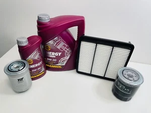 Mitsubishi L200 Worrior 2006-2016 Service kit with 5w30 Engine Oil OEM FILTERS - Picture 1 of 5