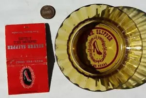 Serie 1970 Las Vegas Nevada zapatillas plateadas casino y hotel cenicero y juego de partidos-- - Imagen 1 de 1