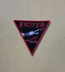 Parche tejido Exciter Heavy Metal Maniac borde rojo (parche oficial) - Imagen 1 de 1