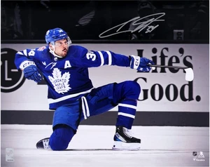 Auston Matthews Maple Leafs Signed 16x20 One Knee Celebration Spotlight Photo - Picture 1 of 1