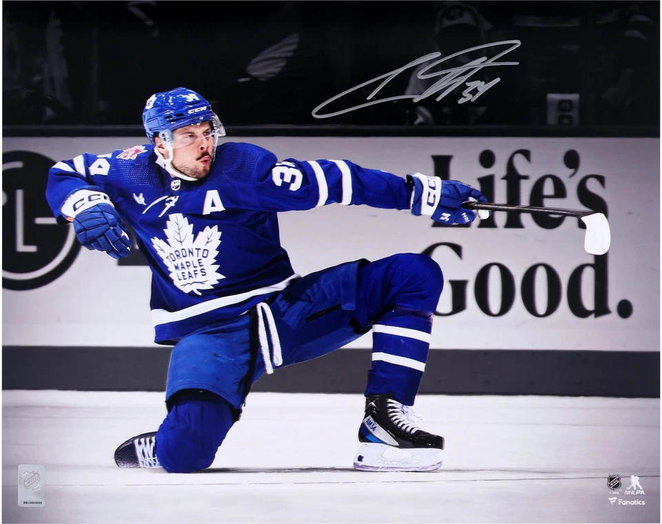 Auston Matthews Maple Leafs Signed 16x20 One Knee Celebration Spotlight Photo - Image 1 of 1