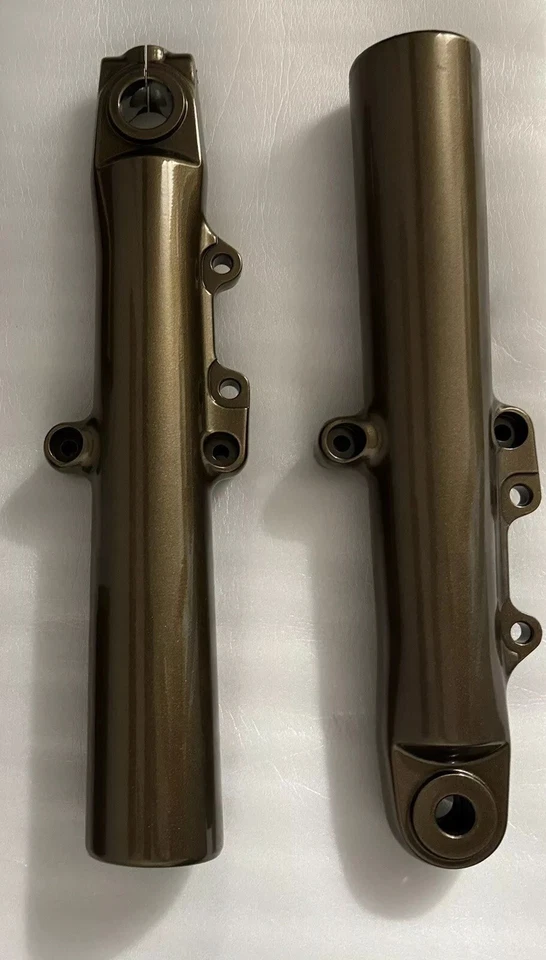 PATAS DE HORQUILLA HARLEY Tri Glide rueda libre 2014-24 bronce brillante OEM deslizadores intercambio Foto 1 de 4