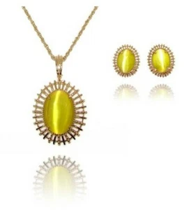 Conjunto de collar colgante ovalado de piedra ojo de gato amarillo brillante con clip - NUEVO - Imagen 1 de 4
