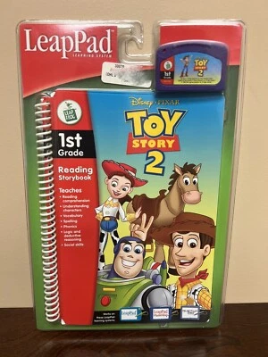 Libro interactivo y cartucho LeapPad Toy Story 2 primer grado Leap Frog totalmente nuevo Foto 1 de 4