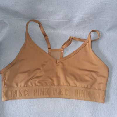 Sujetador deportivo rosa Ultimate by Victoria's Secret espalda cruzada talla M Foto 1 de 4