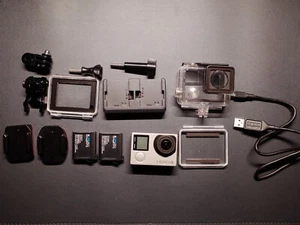 GoPro Hero 4 Silver + 2 batteries + charger + accessories - Photo 1/8