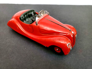 Rare vintage Schuco Examico 4001 red convertible wind-up toy car with key
