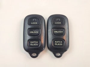 ORIGINAL LOT  OF 2 TOYOTA MATRIX 02-08 OEM KEY LESS REMOTE FOB HATCH GLASS - Picture 1 of 14
