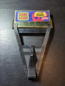Game Genie Video Game Enhancer Cartridge Adapter 1990 Camerica NES - Picture 1 of 2