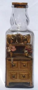 2nd of 2 bottle whimsies with a dresser, painted gold. Both by the same maker. - Picture 1 of 6