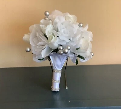 White roses, white rosebuds and silver berries bridal bouquet - Image 1 of 4