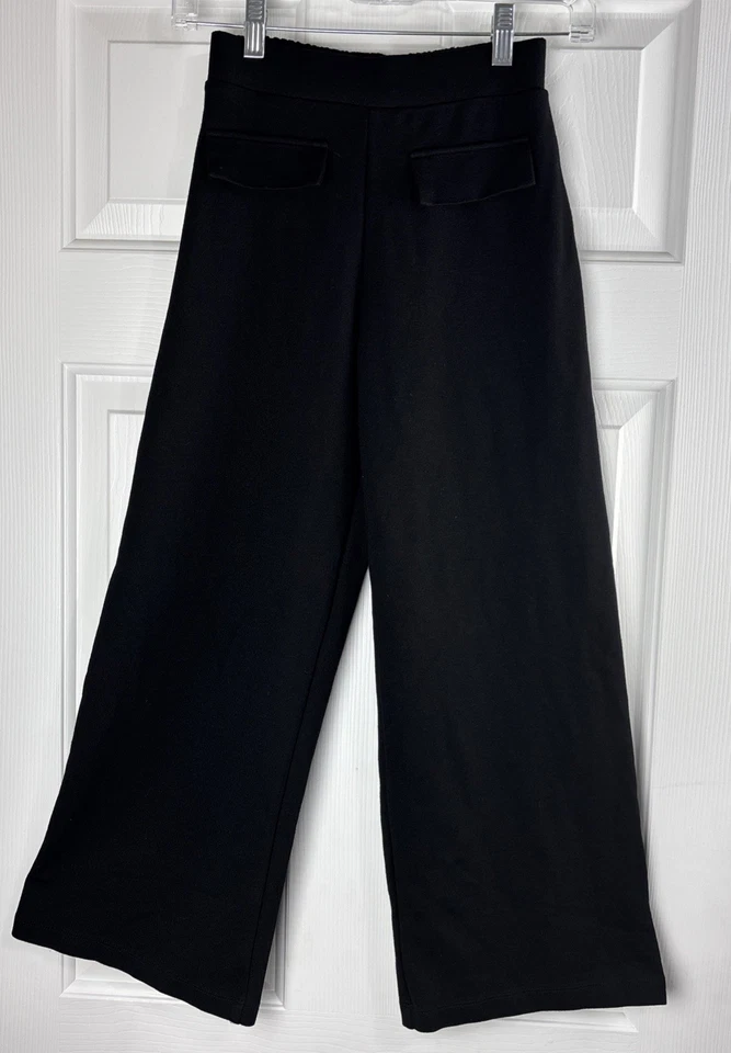 Pantalones Zara Niñas Pierna Ancha Talla 13-14 Negros Elásticos Tirar de Imitación Bolsillos Frontales Foto 1 de 4