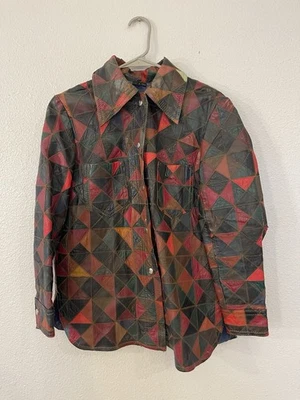 Винтажная кожаная стеганая лоскутная куртка 1970-х размер 40 геометрический треугольник читать - Изображение 1 из 4