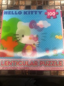 NEW ~ HELLO KITTY ~ 100 PIECE PUZZLE ~ LENTICULAR MOTION Kitty Riding Bicycle - Picture 1 of 4