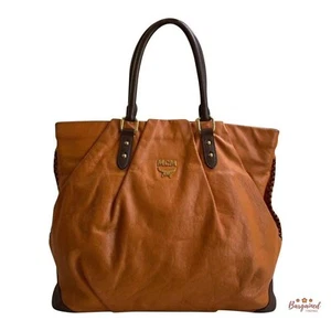 Auténtico Bolso de Mano MCM Saddle/Cuero Marrón Oscuro Mediano con Herrajes Dorados  - Imagen 1 de 13