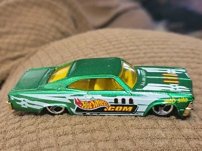 COCHE DIECAST Hot Wheels '65 IMPALA VERDE METÁLICO ESCALA 1/64 EN MUY BUEN ESTADO C136A  Foto 1 de 4