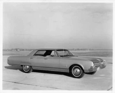 1966 Oldsmobile Ninety-Eight Holiday Sedan Press Photo and Release 0101 - Image 1 of 2
