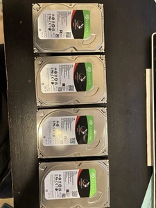 Four - 1 TB Seagate Ironwolf NAS hard drives (ST1000VN002) in good condition - Picture 1 of 9