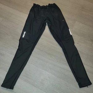 NIKE Dri Fit Elastic Waist Reflictive Zippers Hem Running Psnts Black M Workout - Picture 1 of 12