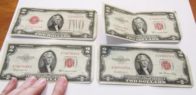 4 vintage worn 2 dollar bills w/red seals: series 1928G; 1953C (2 of them); 1953 - Image 1 of 4