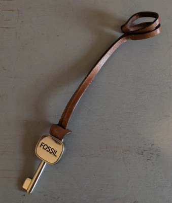 Key Fossil Logo Monogram Leather Loop Bag Purse Hang Tag Silver Gold Keychain 2" - Image 1 of 4