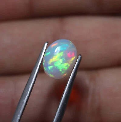 10x8 MM 1.5 Cts Natural AAA Green Red Fire Ethiopian Opal Oval Cabochon - Image 1 of 4