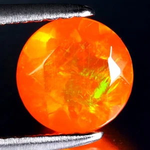 0.74 ct Incredible Round Cut (7 x 7 mm) Heated Orange Fire Opal Loose Gemstone - Picture 1 of 2