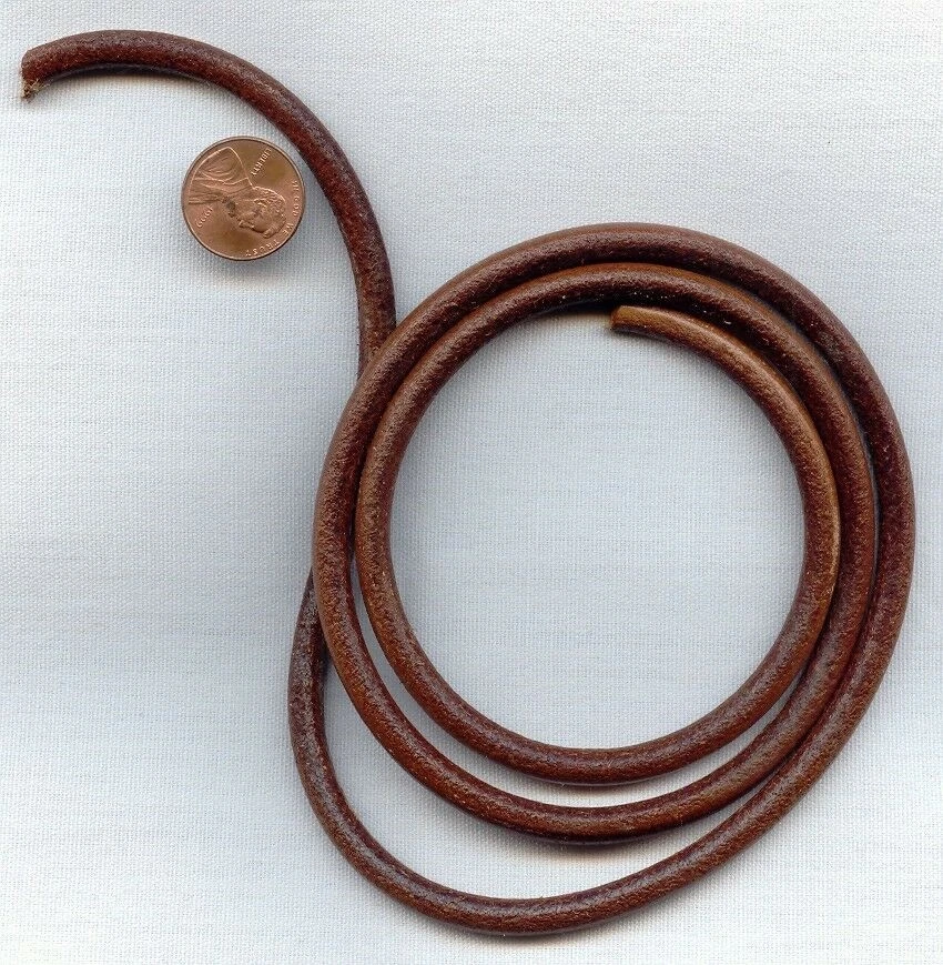 3 ФУТА ВИНТАЖНЫЙ КОРИЧНЕВЫЙ ИЗ НАТУРАЛЬНОЙ КОЖИ ОКРУГЛЫЙ 6 мм. ШНУР ДЛЯ РУКОДЕЛИЯ И ЮВЕЛИРНЫХ ИЗДЕЛИЙ D273 - Изображение 1 из 1