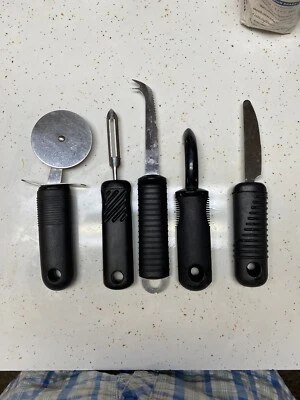 5 utensilios de agarre grande 2 peladores 1 cuchillo de queso 1 esparcidor 1 cortador de pizza Foto 1 de 2