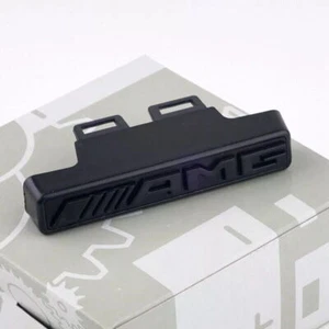 Original Mercedes Benz 2019+ W463A G63 parrilla delantera AMG emblema insignia negro NUEVO - Imagen 1 de 5